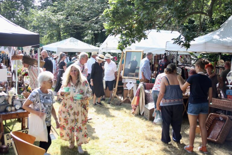 Poster for Haydon Summer Vintage Fair showcasing vintage items and community spirit.