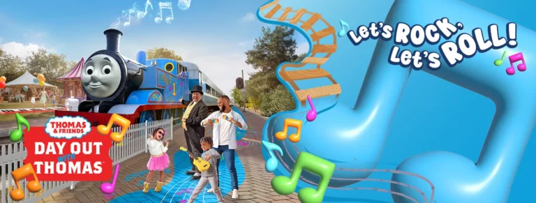 A cheerful family enjoying a day out with Thomas the Tank Engine at the East Anglian Railway Museum.